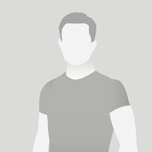 Silhouette einer männlichen Person in einem grauen Hintergrund, nur mit Umrissen und ohne Gesichtszüge sichtbar.